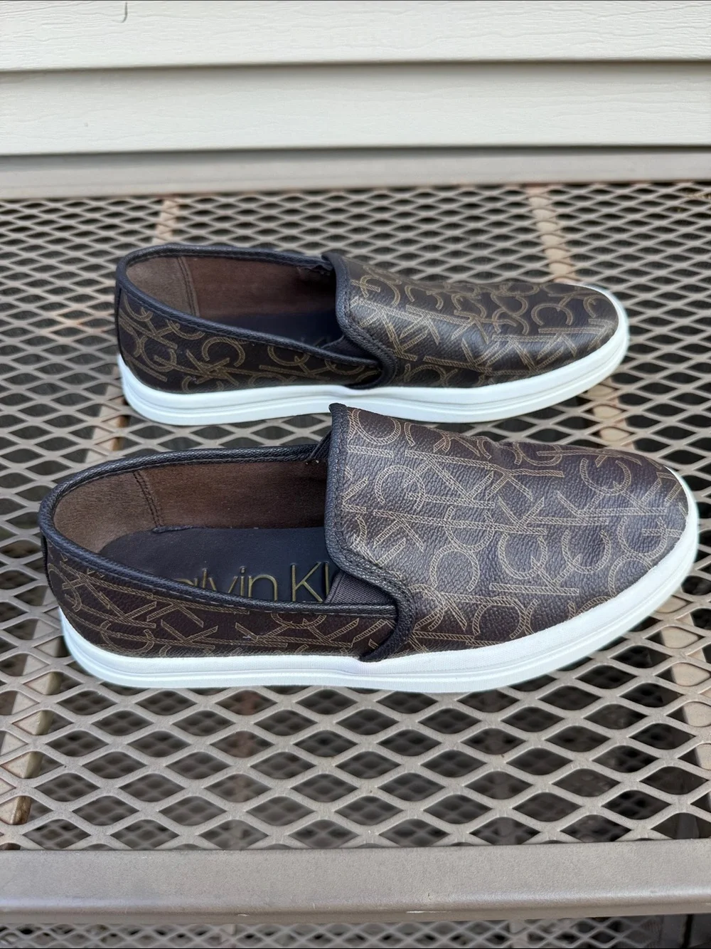 Calvin Klein Women's Black Logo Slip-On Loafer with White Sole